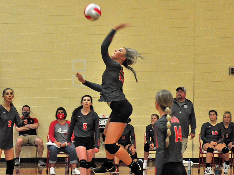 Lady Cougar Sapporiah Ross spikes the ball during the Lady Cougar’s match with the Tellico Bears Monday, August 24.
