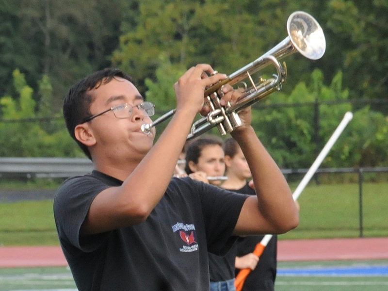 Angel Garcia performs to a crowd at the football scrimmage halftime show Friday, August 28.