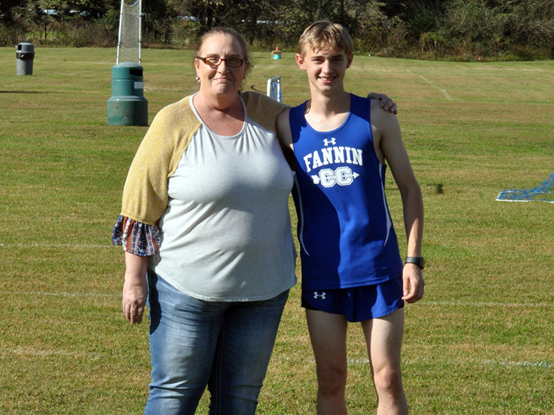Jacob Keppel was honored with the cross country seniors before their home meet Wednesday October 21. Keppel is shown with his mother, Lucy Keppel.
