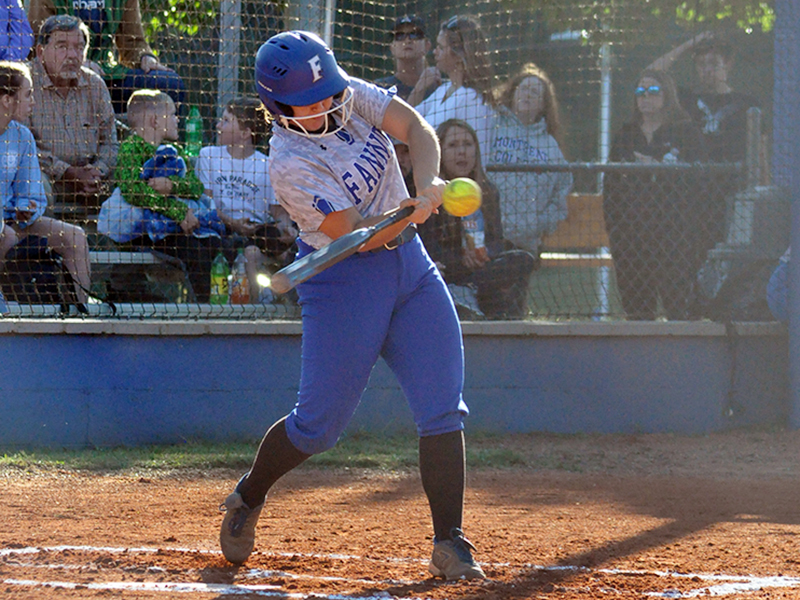 Lady Rebel Chelsey Fry hits a ball during Fannin County’s game with the Coosa Eagles Wednesday, September 30.