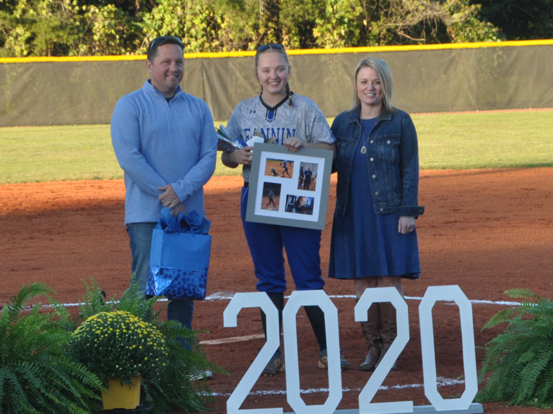 The Fannin County Lady Rebels softball team honored three seniors during the team’s  senior night Wednesday, September 30. Emma Mitchell was the first to be honored and is shown with her parents Chan and Amber Mitchell.