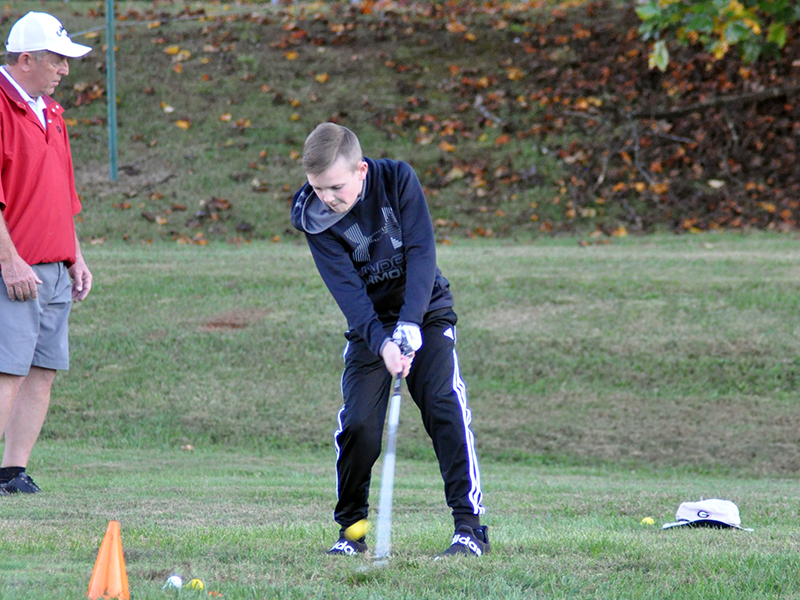 Logan Long works on his chipping game at golf practice hosted by the Fannin County Recreation Department Tuesday, October 13.