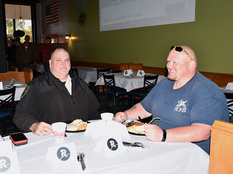 Fannin County Sheriff’s Office Sergeant John Bramlett, left, and Firefighter/Paramedic Mathew Kerry joined their fellow first responders for a breakfast meal hosted the “Ridge Men” from The Ridge Community Church Friday, October 16.