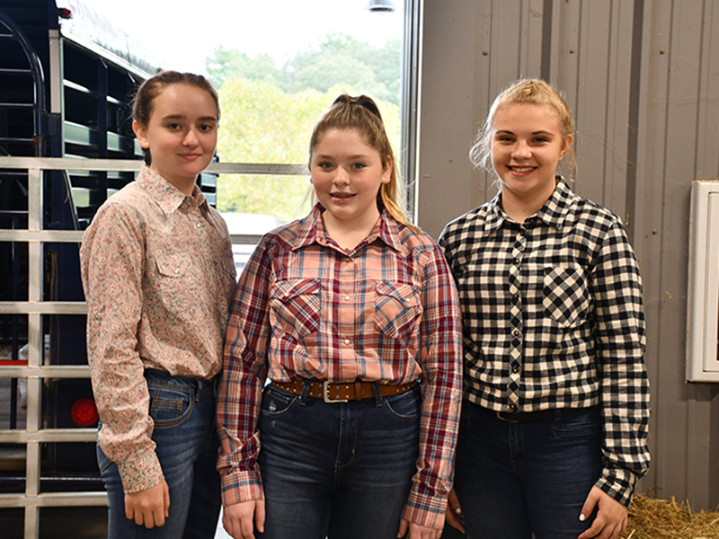 FFA and 4-H students participated in the Fannin County Youth Fair at the Fannin County Agriculture Facility Saturday, September 28. Shown are, from left, Kaleighann Ware, Alyssa Marshall and Tamra Couch.