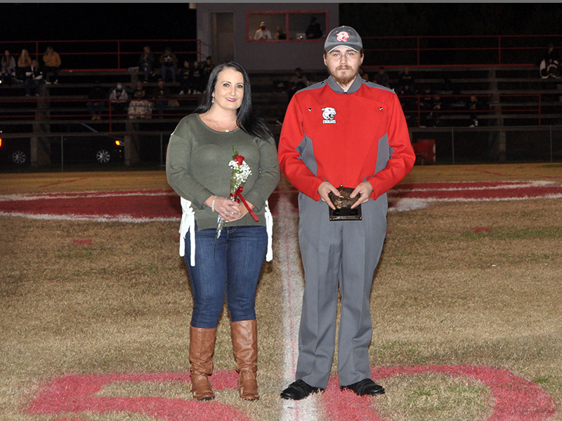 Copper Basin High School honored their golf, band, cheerleaders and football seniors Friday, November 6, at the Cougars home playoff game against Clay County. Senior band member Zeke Brendle is shown with Dena Crawford Brendle.