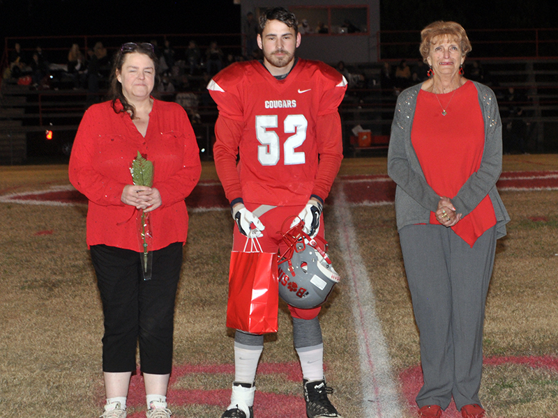 Copper Basin honored it’s seniors before the Cougars football game against Clay County Friday, November 6. Football senior Larry Dye is shown escorted by his mother Susan Dye and grandmother Sheila Ownby.