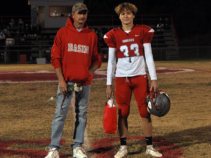 Senior football player Timothy Fair was honored during Copper Basin’s senior night ceremony Friday, November 6. Fair is shown with his father, Scott Fair.
