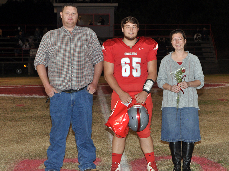 Copper Basin honored its football seniors Friday, November 6, before their last home game against Clay County. Senior football player Joseph Johnson is shown with his parents Daniel and Jennifer Johnson.