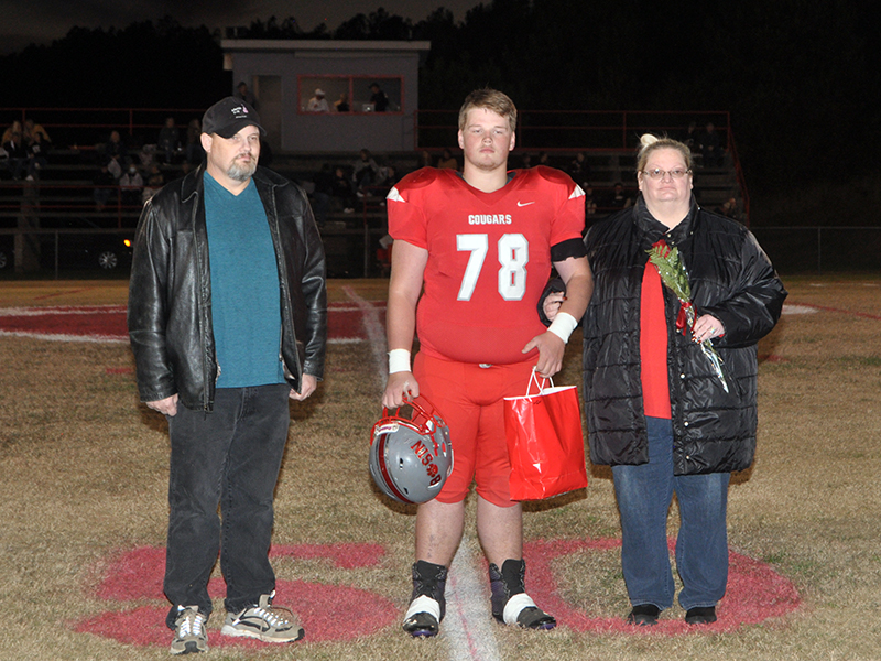 Copper Basin honored its football seniors Friday, November 6, before their last home game against Clay County. Senior football player Hunter Perry is shown with his parents, Scott and Lisa Perry.