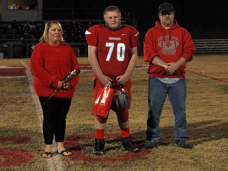 Copper Basin honored its football seniors Friday, November 6, before their last home game against Clay County. Senior football player Blake Picklesimer is shown with his parents, Amanda Gray and Tim Picklesimer.
