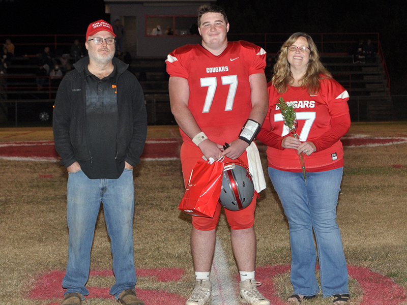 Copper Basin honored its football seniors Friday, November 6, before their last home game against Clay County. Senior football player Dawson Worthy is shown with his parents Tim and Alicia Worthy.
