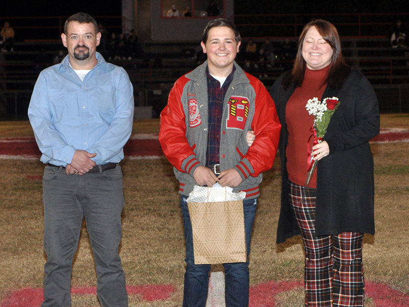 The Copper Basin Cougars honored it’s band, golf, cheerleader and football seniors Friday, November 6. Senior golf member Jacob Smith is escorted by Jeremy Smith and Andrea Dalton.