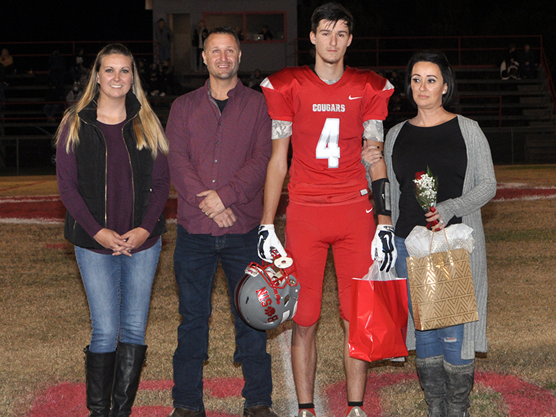 Senior Cougar football player Austin Collis was honored during senior night at Copper Basin High School Friday, November 6. Shown are, from left, Laura Collis, Jason Collis, Austin Collis and Kristin Kincaid