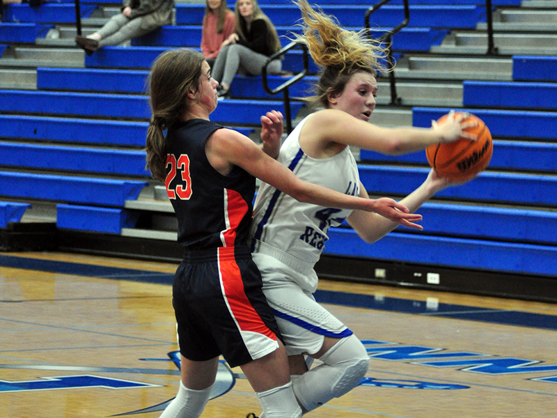 Lady Rebel Olivia Sisson fights through contact during Fannin’s game with Habersham Thursday, November 12.