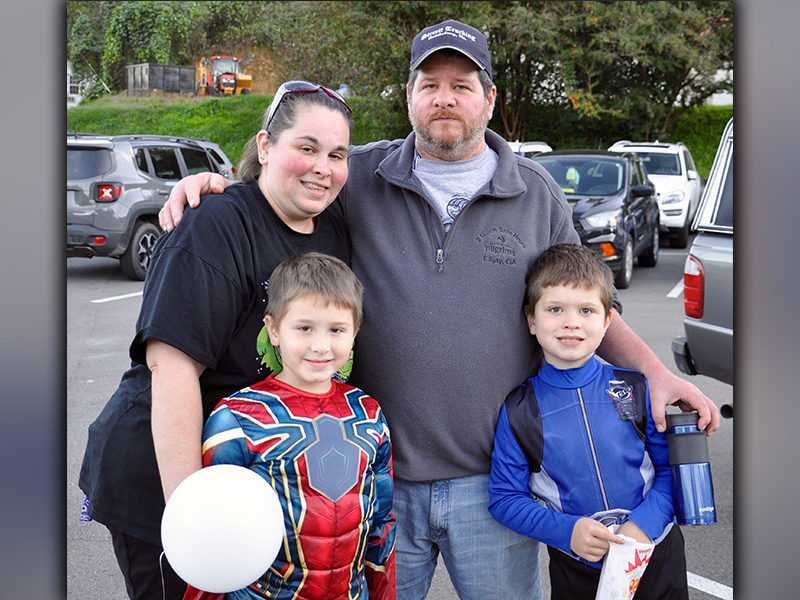 The Carroll family didn’t waste any time going out and getting their share of Halloween Candy during McCaysville and Copperhill’s annual Halloween Safe Zone Saturday, October 31. Shown are, from left, back, Steve and April and, front, Noah and Stephen.