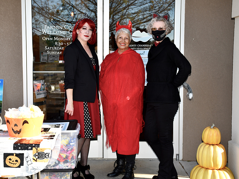 Trick-or-treaters were in for a fun treat when they visited the Fannin County Chamber of Commerce on Halloween. Shown are, from left, Director of Communications & Events Kim Foster, Director of Membership Dianne Mallernee and Guest Services representative Lynn Johnson.