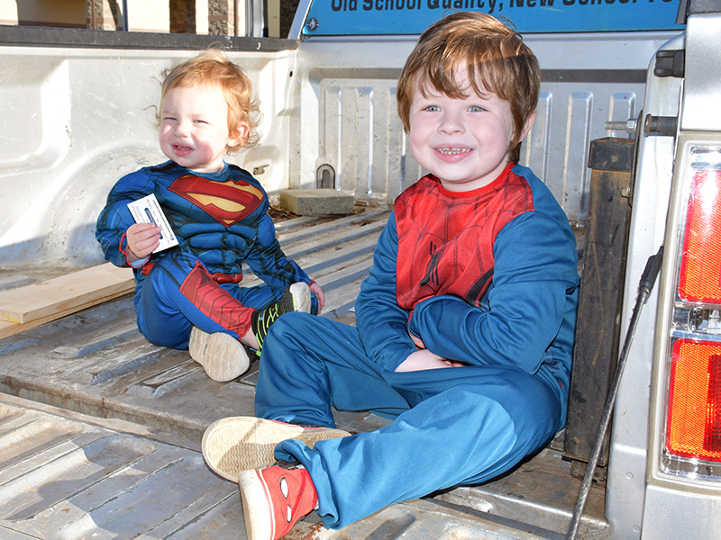 Superman and Spiderman, also known as Creedance and Loris, helped pass out candy to trick-or-treaters at the Blue Ridge Community drive-thru safe zone event Saturday, October 31.