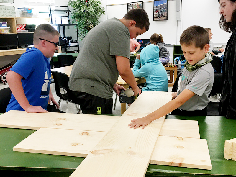Fifth grade students at Blue Ridge Elementary School helped build and assemble the new Bears Farm and Arts Mini Famer’s Market. Shown are, from left, Cale Weeks, Gabe Partin, Kole Stanley and Riley Ledford.