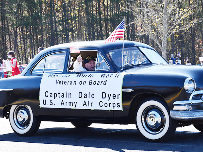 World War II Army Veteran Dale Dyer excitedly waved to the students, faculty and staff of Fannin County Middle School during the school’s drive-thru Veterans’ Day Parade Friday, November 6.