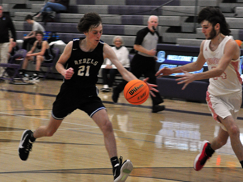 Fannin Rebel Nick Arp (21) stops a Copper Basin fast break during the Rebels and Cougars game Tuesday, November 24.