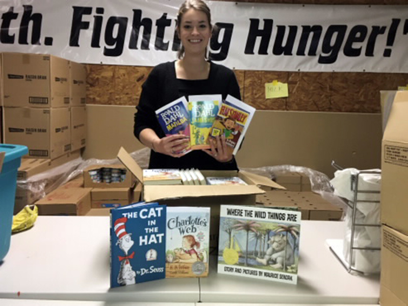 West Fannin Elementary School teacher Cayley Hamilton recently partnered with Snack in a Backpack to distribute books to Fannin County children who receive snack packs.