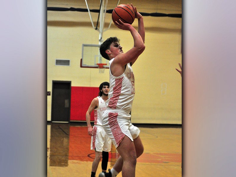 Timothy Jabaley shoots a two-point jumper during the Cougars basketball game against Towns County Monday, January 18.