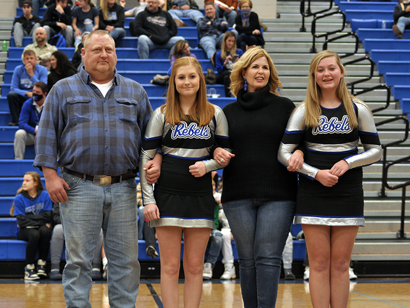 Fannin County High School senior cheerleader Courtney Tamberino was one of 15 cheer and basketball seniors honored at the senior night ceremony Friday, January 15. Shown during the ceremony are, from left, father, Chip Tamberino; Tamberino; mother, Ashley Tamberino; and sister, Katherine Tamberino.