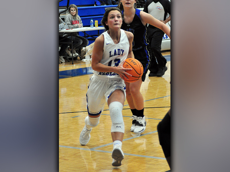 Lady Rebel Becca Ledford drives to the basket in recent action for the Fannin County basketball team.