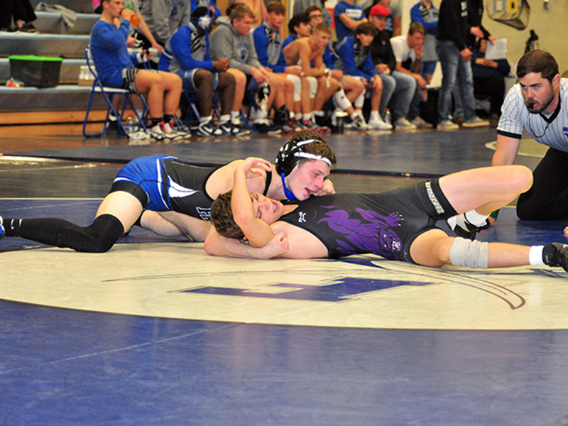 Kolton Stephens works his opponent during the Rebels wrestling team’s win against Union County Friday, January 15.