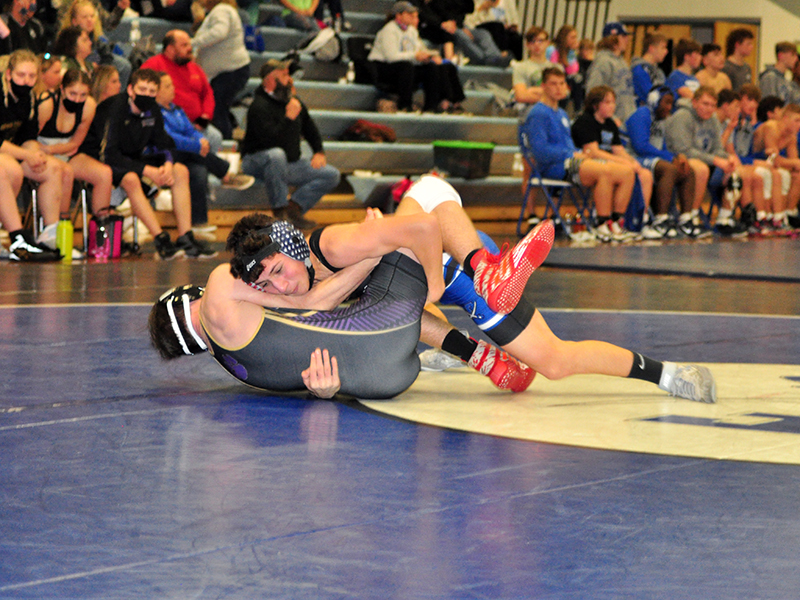 Zechariah Prater works his opponent during the Rebels Area Duals Friday, January 15. The Rebels finished as runner up in the contest.