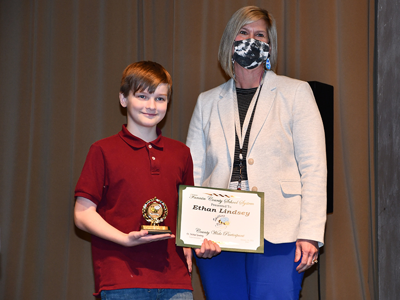 Blue Ridge Elementary School student Ethan Lindsey represented his school in the Fannin County School System District Spelling Bee Thursday, January 14, after winning his school bee. He is shown with his principal, Dr. April Hodges.