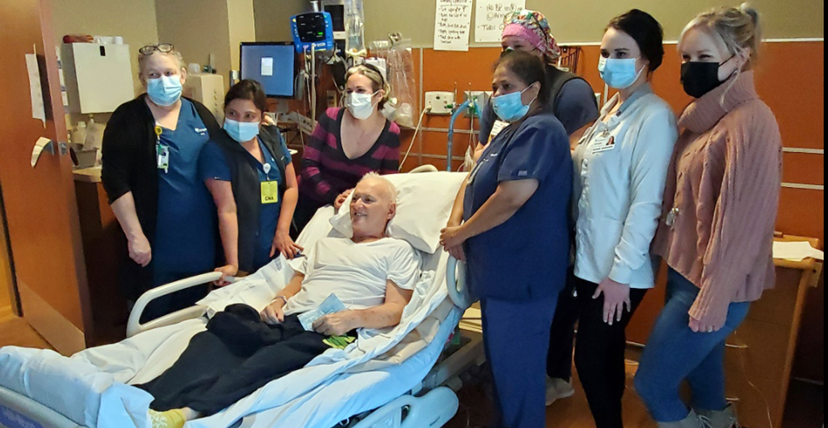 Johnny Scearce was all smiles as he prepared to leave CHI Memorial Hospital in Chattanooga last week. He is surrounded by several members of the hospital team that took care of him. Scearce was moved to an intensive rehab program where he will undergo physical therapy. 