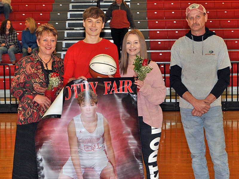 Timothy Fair was honored at Copper Basin’s senior night ceremony Saturday, February 6, along with 10 other basketball and cheerleadind seniors. Shown are, from left, mother, Christine Thomas; senior, Fair; girlfriend, Paige Remlinger; and father Scott Fair.