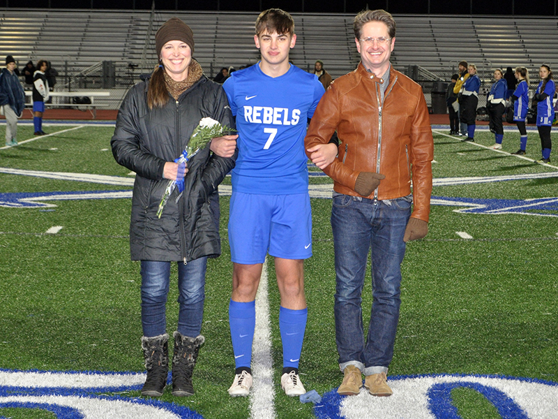 Andrew Harris was one of 14 seniors honored during Fannin’s home soccer game against Gordon Central Friday, February 19. He is shown with his parents, Kathryn Durham and Benjamin Harris.