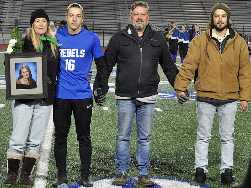 Andrew Jones was honored during the senior night ceremony at Fannin’s home soccer game against Gordon Central Friday, February 19. Shown during the ceremony are, from left, Melinda Jones, mother, holding a photo of the late Sydnie Jones; Jones, senior; Anthony Jones, father; and Connor Jones, brother.