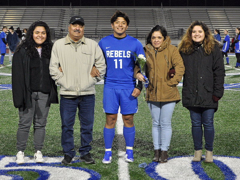 Juan Leal was honored along with 13 other Rebel and Lady Rebel soccer players during Fannin’s home soccer game against Gordon Central Friday, February 19. Leal is shown with his parents Jose and Maria Leal.