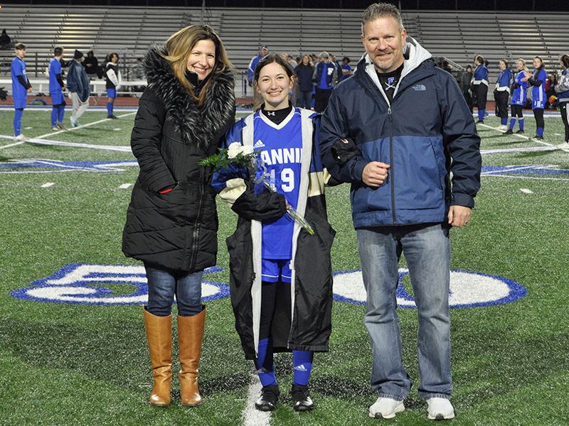 Isabella Tocci was one of 14 seniors honored during Fannin’s home soccer game against Gordon Central Friday, February 19. She is shown being escorted by Erik and Christina Cioffi.
