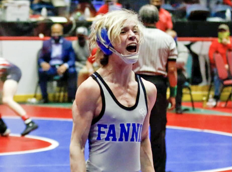 Blake Summers celebrates after his match that crowned him state champion. Summers is the only freshman to win an individual state title in Fannin County High School history.