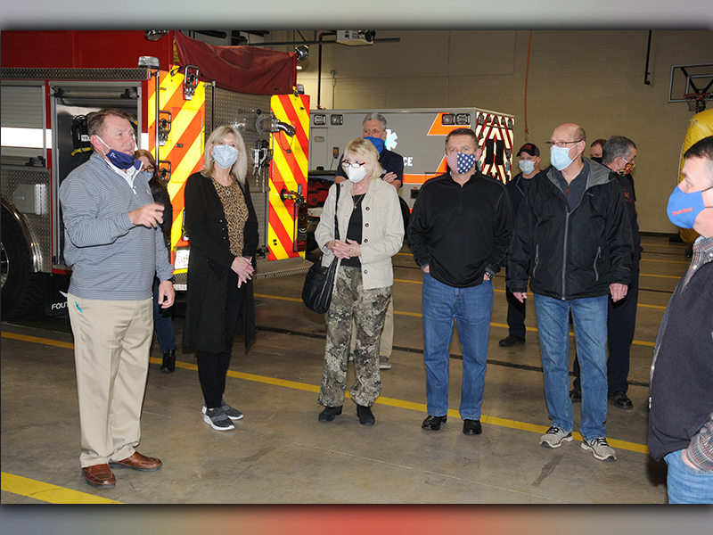 Fannin County volunteer firefighter/EMT Kevin Panter, left, talks about some of the equipment housed at Fire Station 1 with, from his left, McCaysville City Councilwomen Susan Kiker and Gilita Carter, Blue Ridge City Councilman Mike Panter, Fannin County Post Two Commissioner Glenn Patterson and Fannin County Commission Chairman Jamie Hensley.