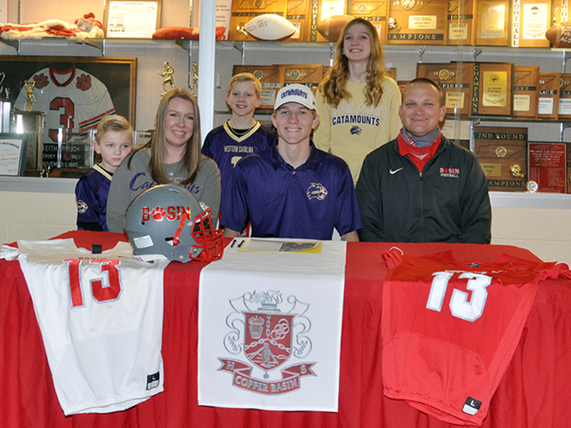 Copper Basin quarterback Bryson Grabowski signed his letter of intent to further his academic and athletic football career at Western Carolina University Wednesday, February 3. Shown following the signing ceremony are, from left, front, brother, Eli Grabowski; mother, Amber Grabowski; senior Grabowski; father, Chad Grabowski; and back, brother, Kaeden Grabowski; and sister, Peyton Grabowski.