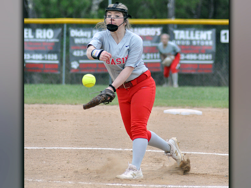 Kaitlyn Goode throws one of her many strikes in the Lady Cougars game against Chattanooga Girls Leadership Academy Monday, March 15. Goode ended game one of the double header with nine strike-outs.