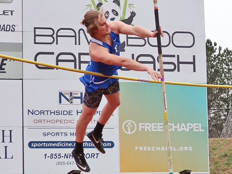James Mercer focuses as he pole vaults nine feet six inches to take a first place finish in the Rebels tri-match Tuesday, March 23.