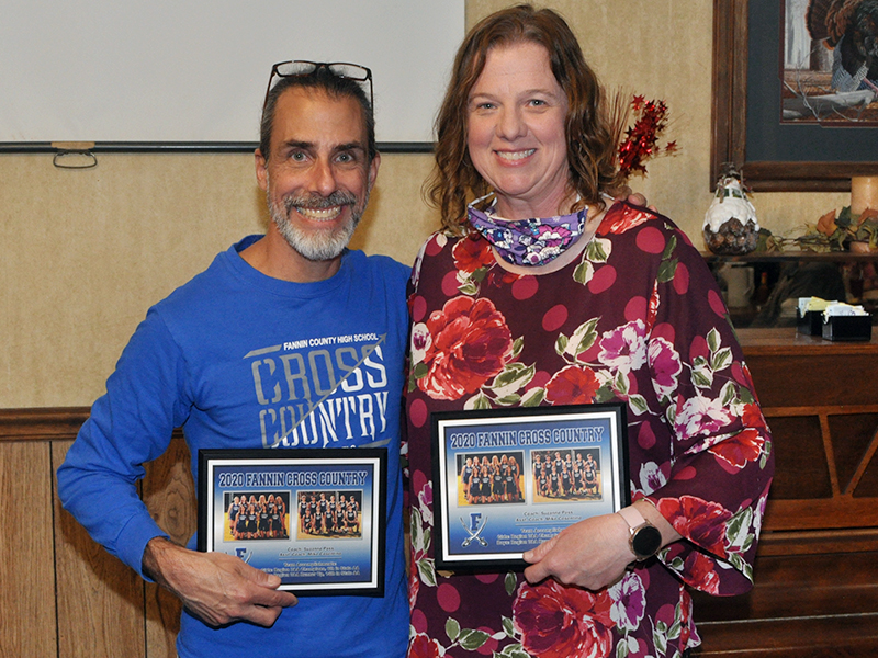 Fannin County cross country coaches Mike Cosentino  and Suzianne Pass were given plaques  with this years achievements for the boys and girls teams at the cross country end-of-season banquet Thursday, March 18.