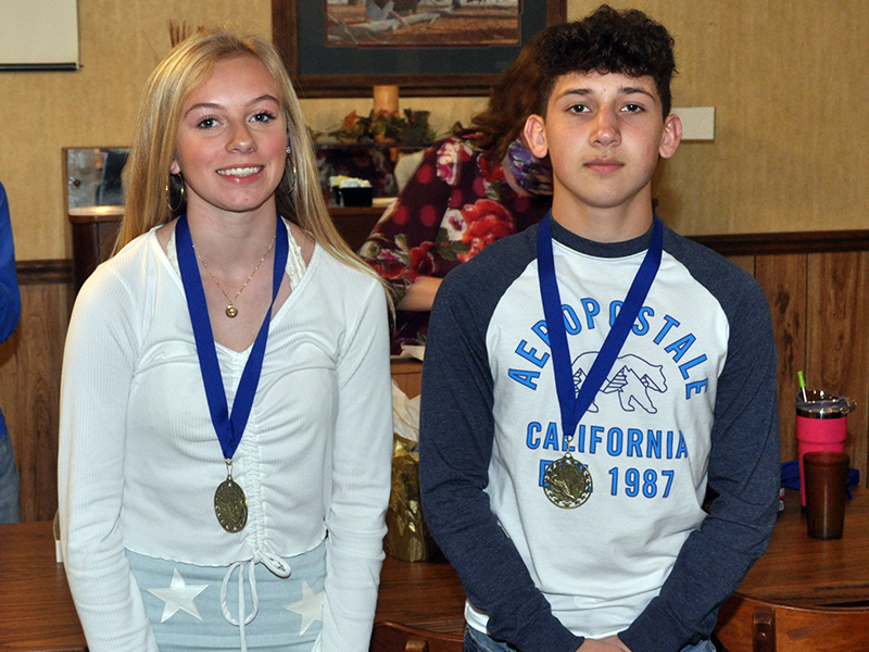 Freshmen Carlee Holloway and Zechariah Prater were awarded the “Runner of the Year” Award during Fannin County’s cross country end of season banquet Thursday, March 18. The award is given to the best placers for the men and women’s team for the season.