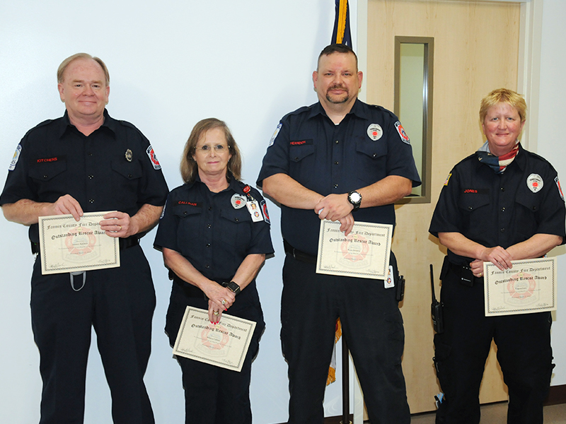 RIGHT: Spencer Kitchens, Becky Callihan, Bryan Herndon and Virginia Jones, from left, were honored with Outstanding Rescue Awards for their part in the Toccoa River rescue of  mother and son trapped in a kayak.
