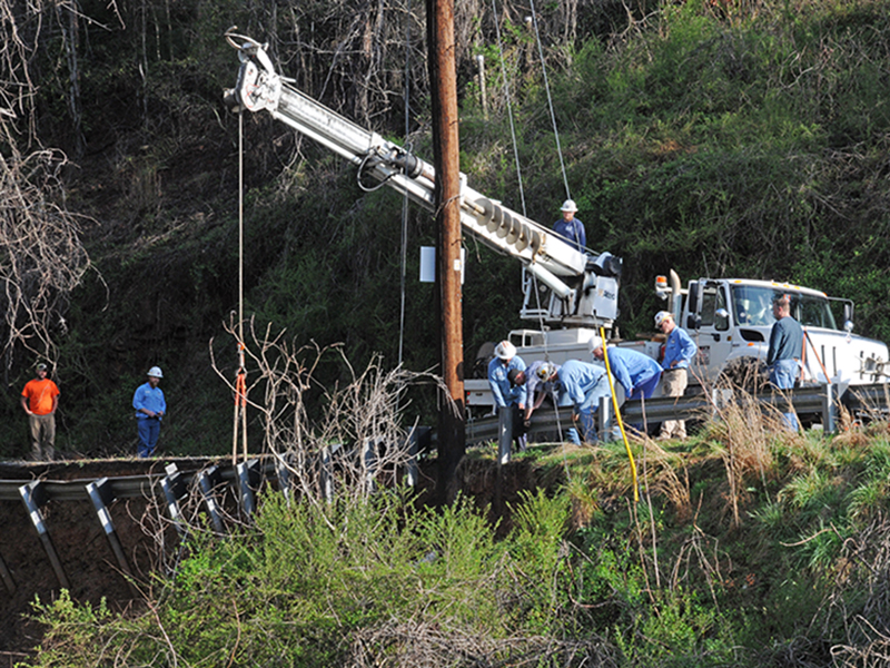 Tri-State EMC crews are busy this morning (Friday, March 26, 10 a.m.) working to stabilize the power pole in the area where a washout on Bullen Gap Road in Blue Ridge destroyed a city water line. 