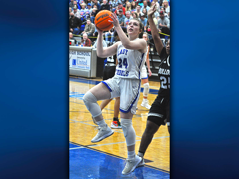 Olivia Sisson drives past a Butler defender in the Final Four matchup Saturday night at Fannin County High School. The 43-41 win advanced the Lady Rebels to the state championship game.