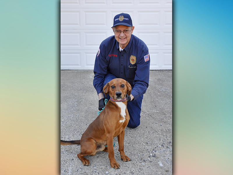 This male Red Bound Hound was picked up on Hardscrabble Road in Mineral Bluff Thursday, March 4. He has a short, red coat and is well behaved. View him using intake number 044-21. He is shown with Animal Control Officer Pat Patterson.