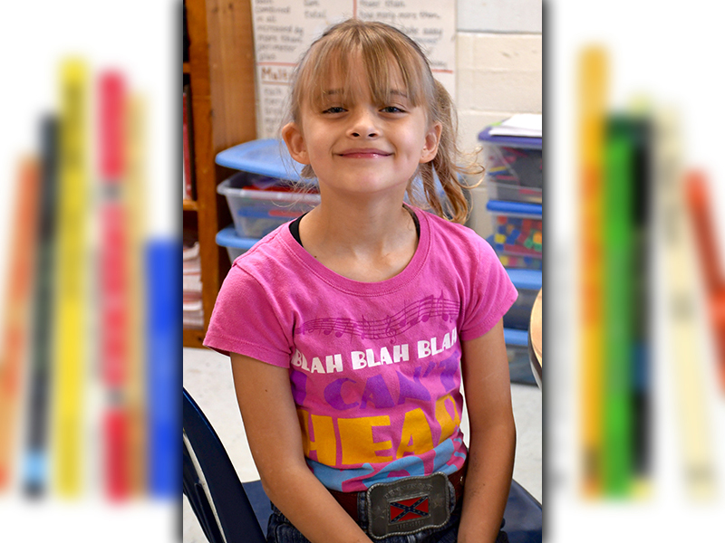 East Fannin Elementary School student Jade Fain was all smiles as she celebrated Read Across America Week with her classmates Wednesday, March 3.