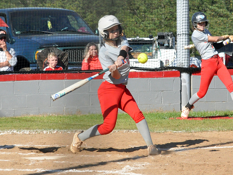 Lady Cougar Channing Beach makes contact with a ball in recent action for the Copper Basin  Lady Cougars softball team.